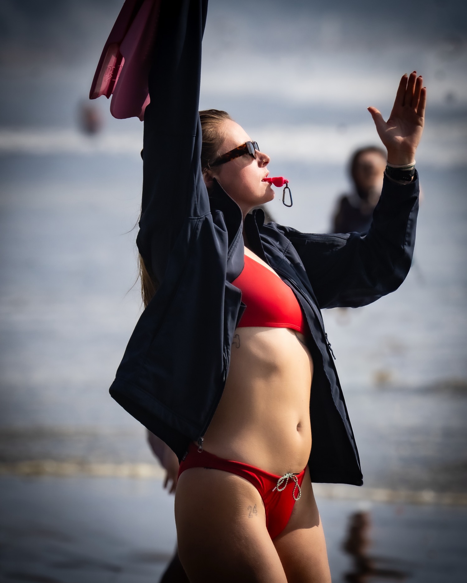 Lifeguard with whistle and fins
