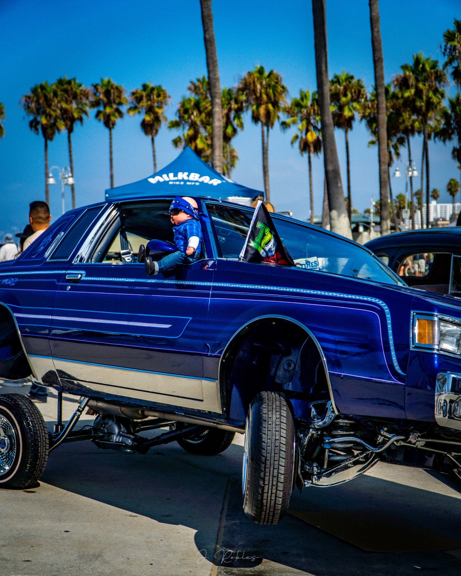 Blue lowrider hopped on hydraulics
