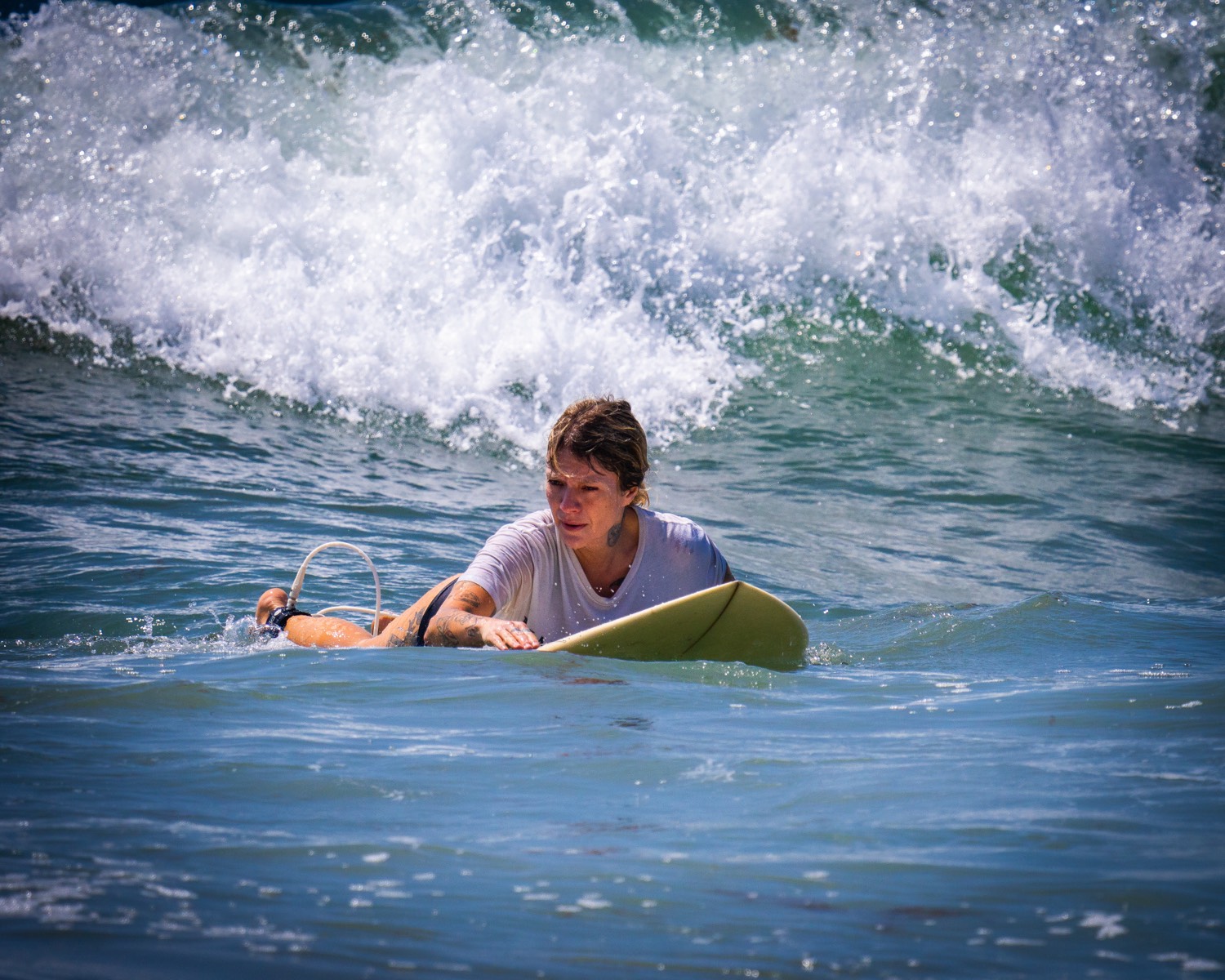 Surfer on a yellow board