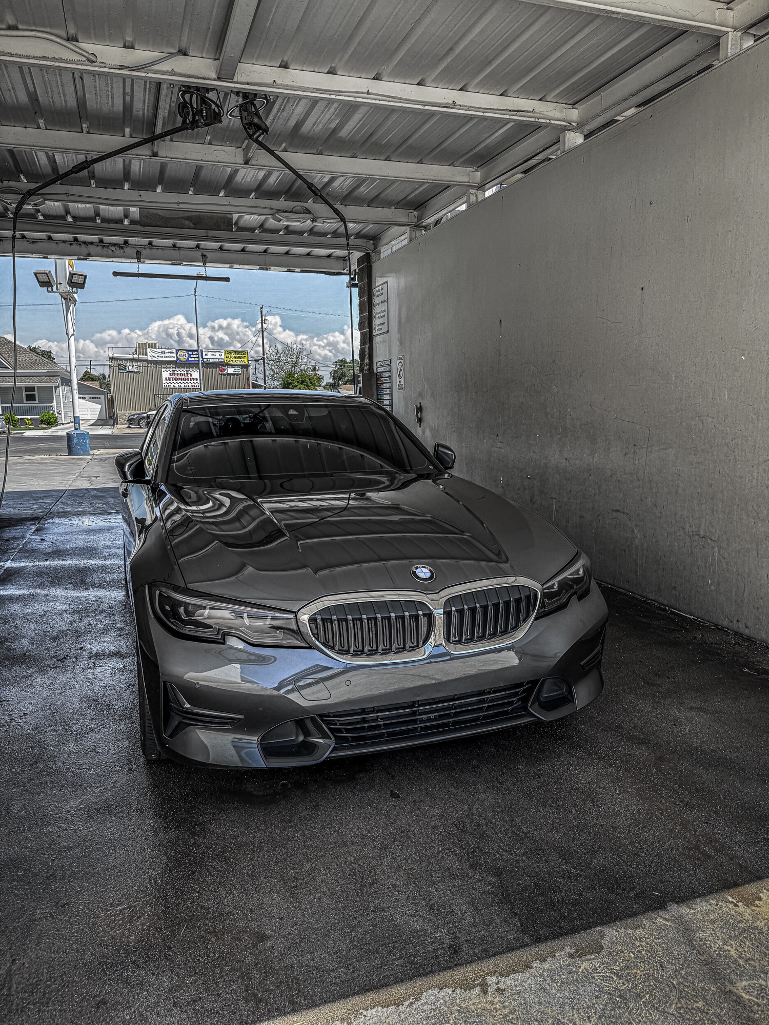 BMW in a car wash bay